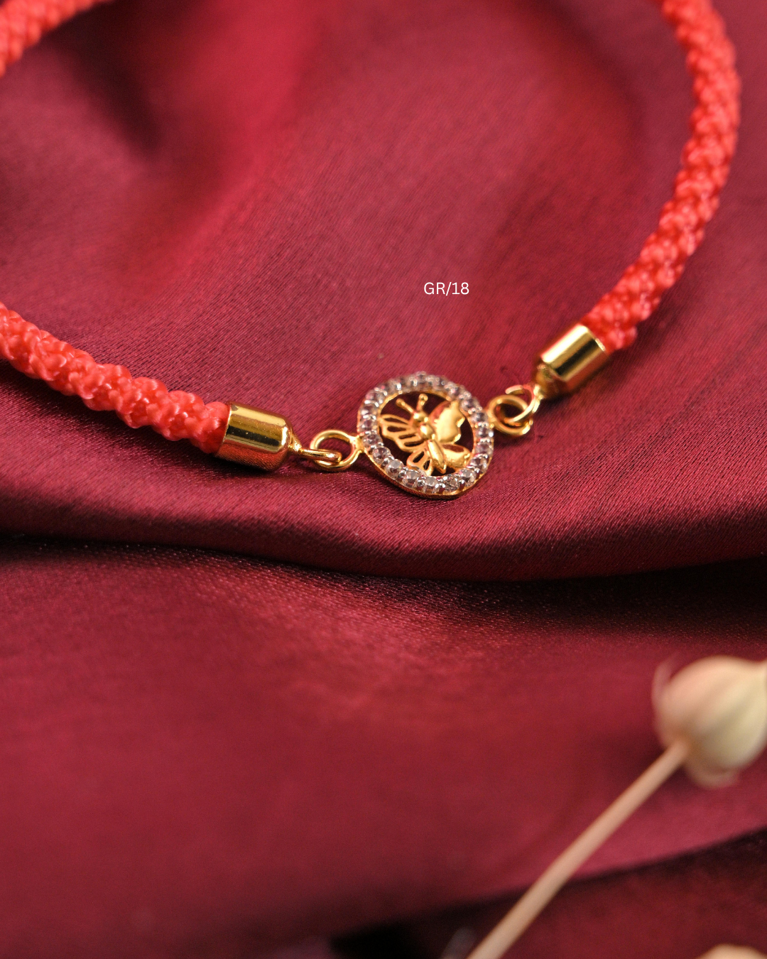 Sculpted Butterfly & CZ Circular Halo Rakhi with Coral Pink Thread |SKU: GR/18