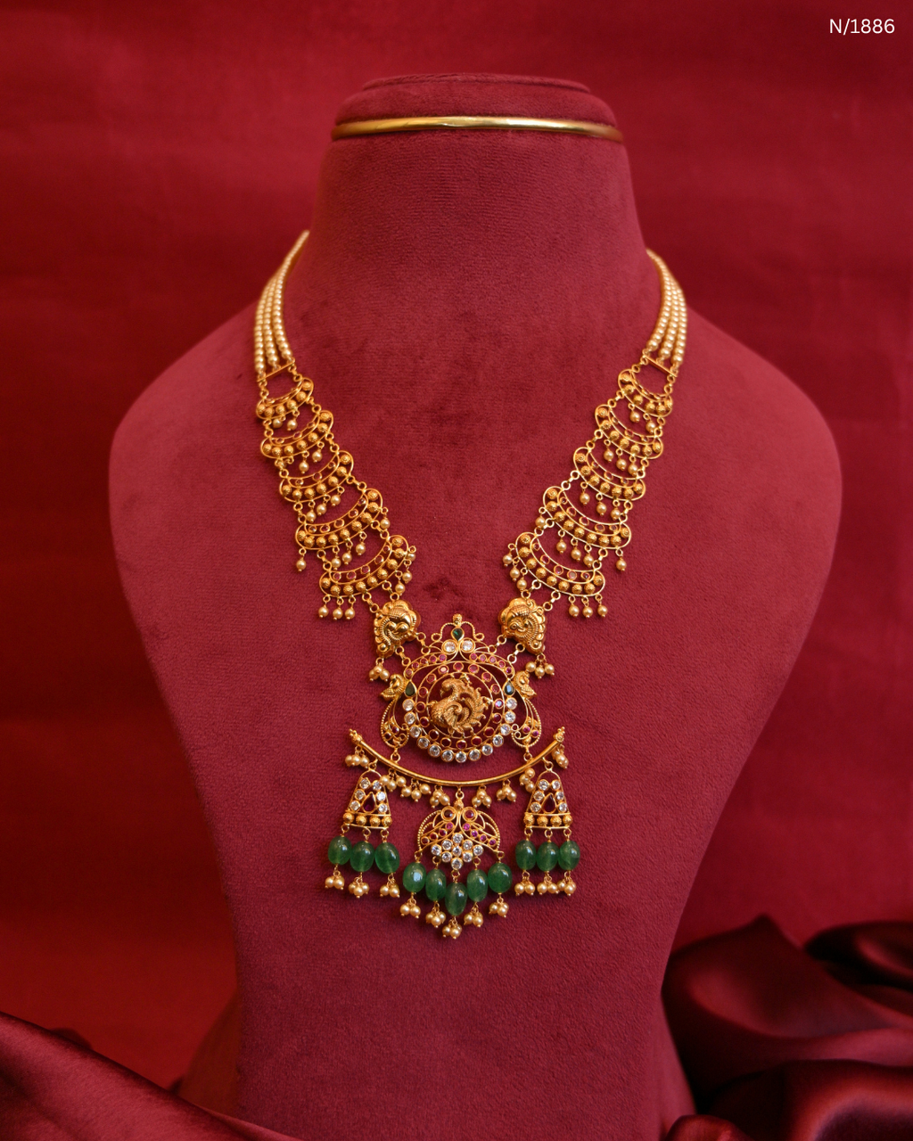 Grand Peacock Nakshi Temple Haram with Multi-Strand Pearls & Emerald Tassels | SKU: N/1886