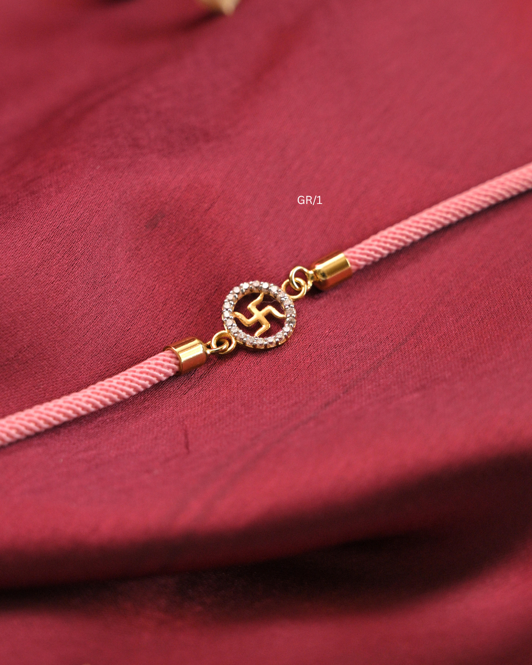 Sacred Swastik & CZ Circular Halo Rakhi with Blush Pink Thread |SKU: GR/1