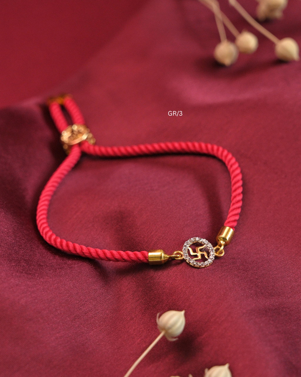 Sacred Swastik & CZ Circular Halo Rakhi with Red Thread | SKU: GR/3