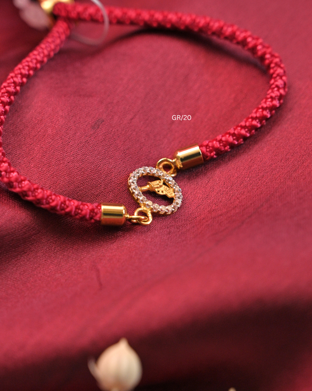 Revolver Gun Motif & CZ Halo Rakhi with Red Thread| SKU:GR/20