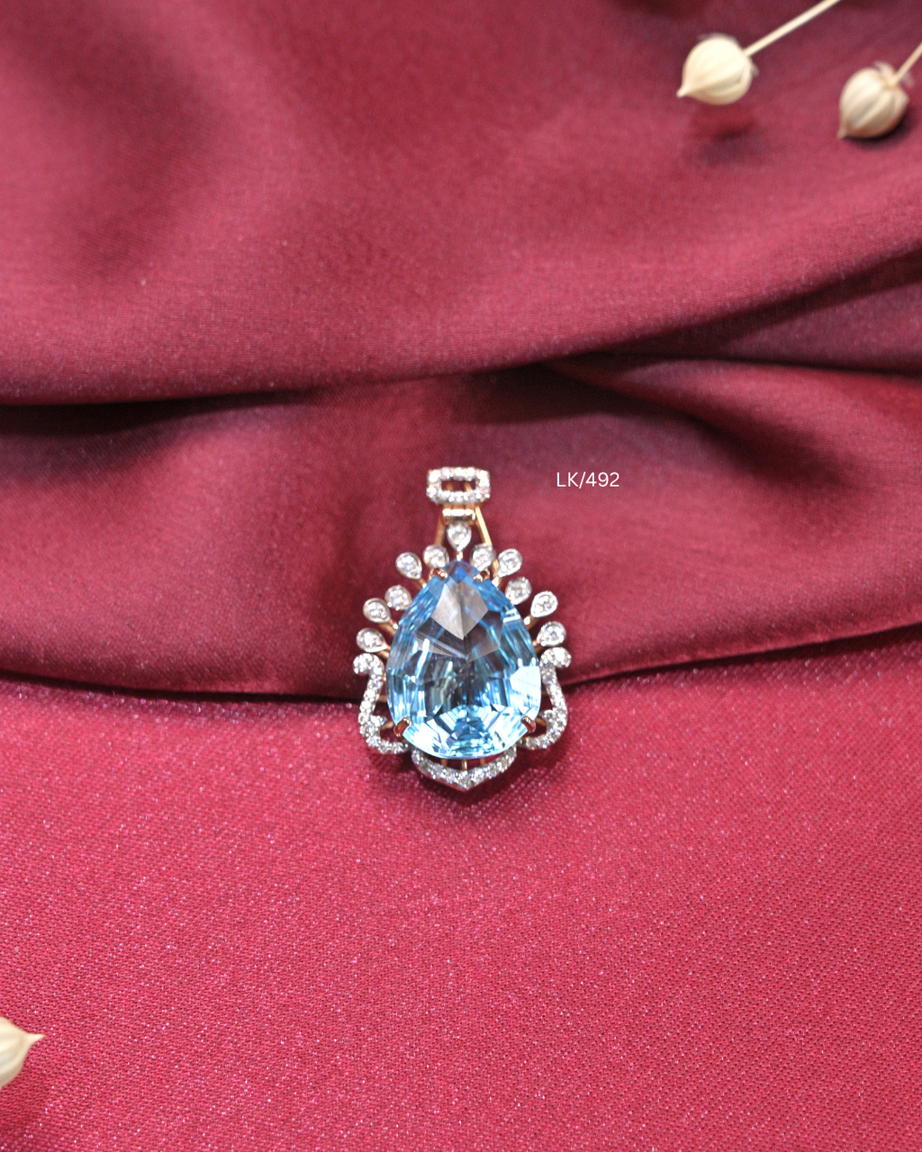 Pear-Cut Aquamarine-Blue Gemstone & CZ Sunburst Frame Pendant | SKU: LK/492
