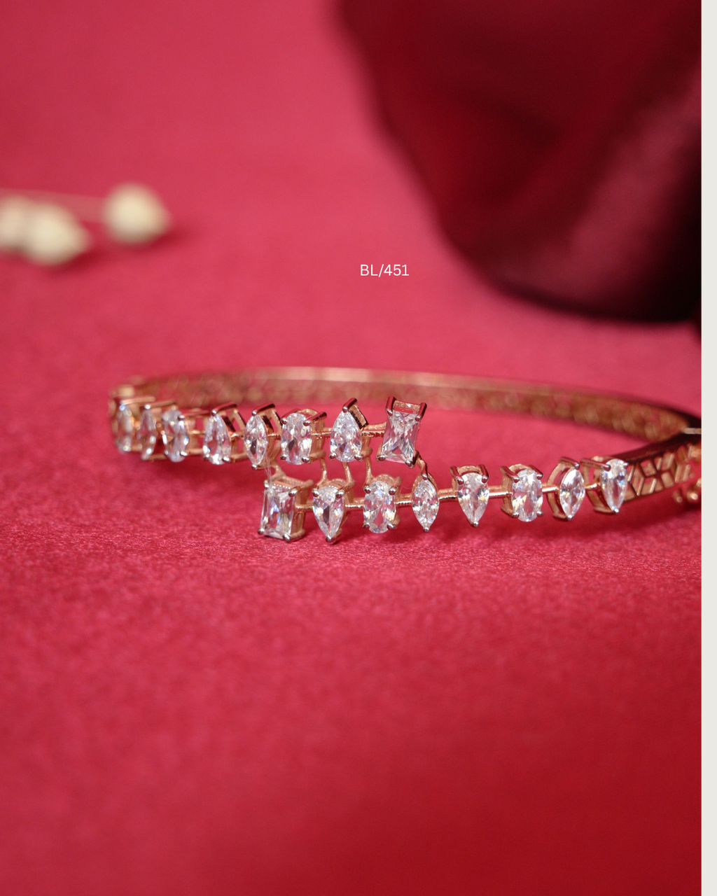 Asymmetric Graduating Fancy-Cut CZ Bypass Bangle | SKU: BL/451