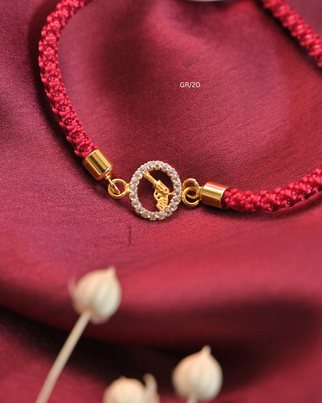 Revolver Gun Motif & CZ Halo Rakhi with Red Thread| SKU:GR/20