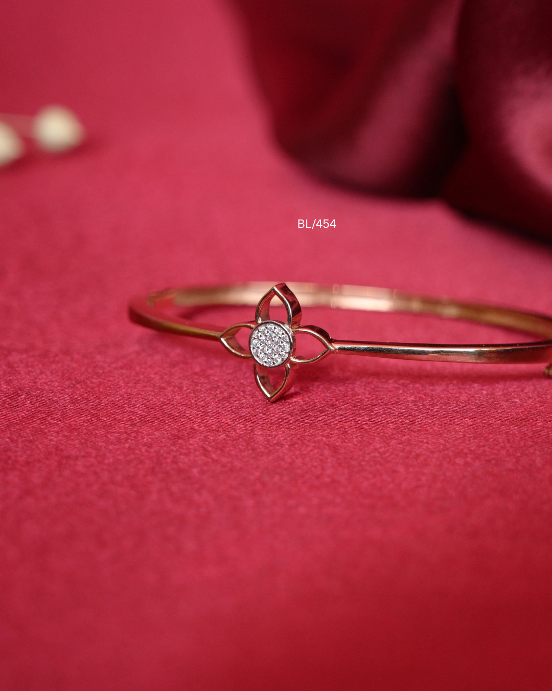 Openwork Four-Petal Floral Station Bangle with Pave CZ Center | SKU: BL/454