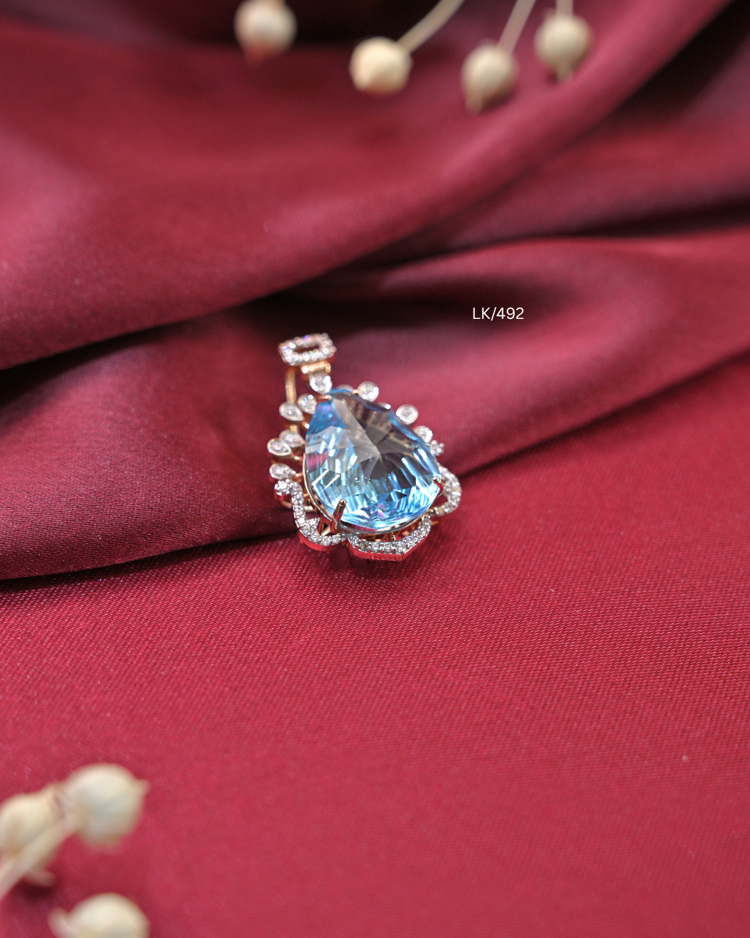 Pear-Cut Aquamarine-Blue Gemstone & CZ Sunburst Frame Pendant | SKU: LK/492