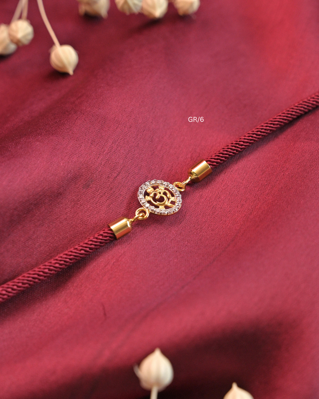 Sacred Om & CZ Halo Rakhi with Maroon Thread | SKU: GR/6