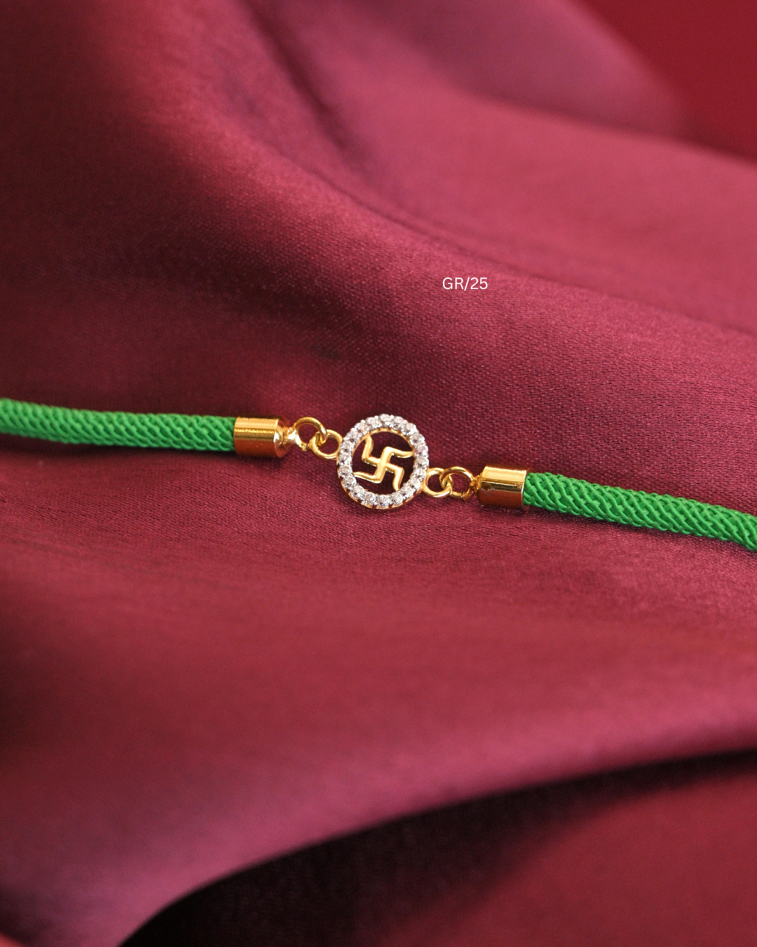 Sacred Swastik & CZ Halo Rakhi with Green Thread | SKU: GR/25