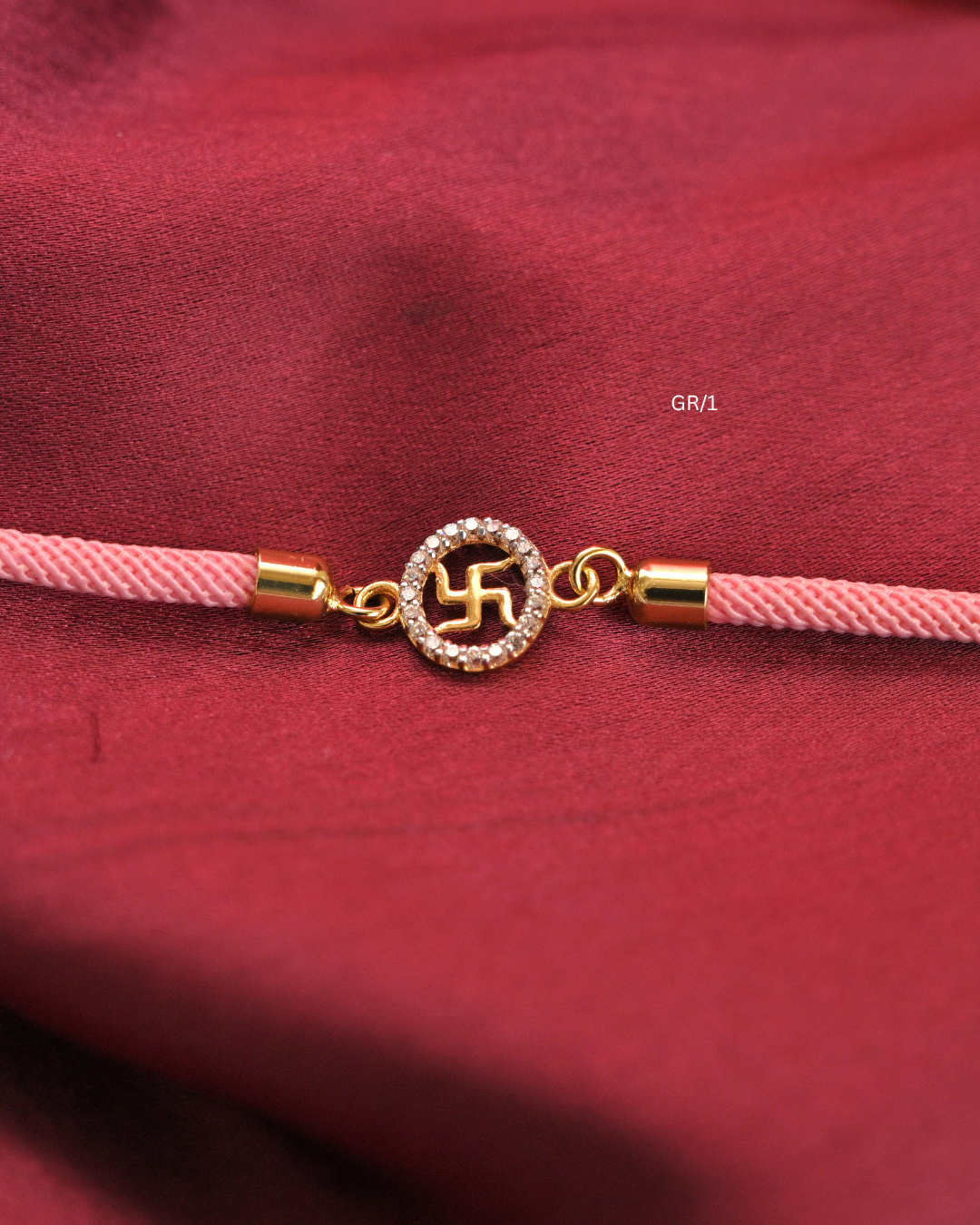 Sacred Swastik & CZ Circular Halo Rakhi with Blush Pink Thread |SKU: GR/1