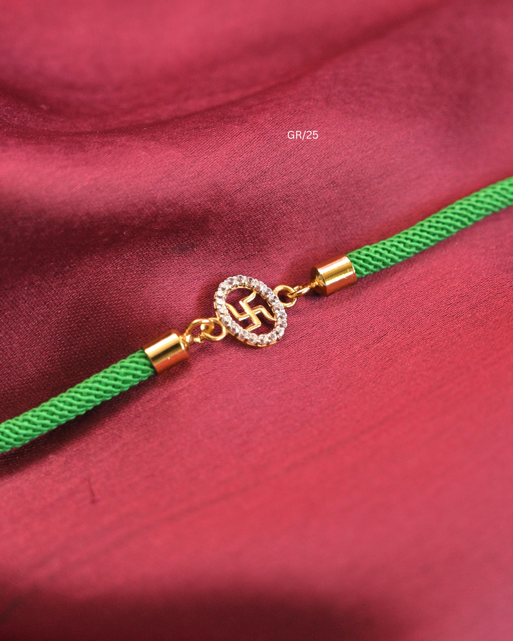 Sacred Swastik & CZ Halo Rakhi with Green Thread | SKU: GR/25