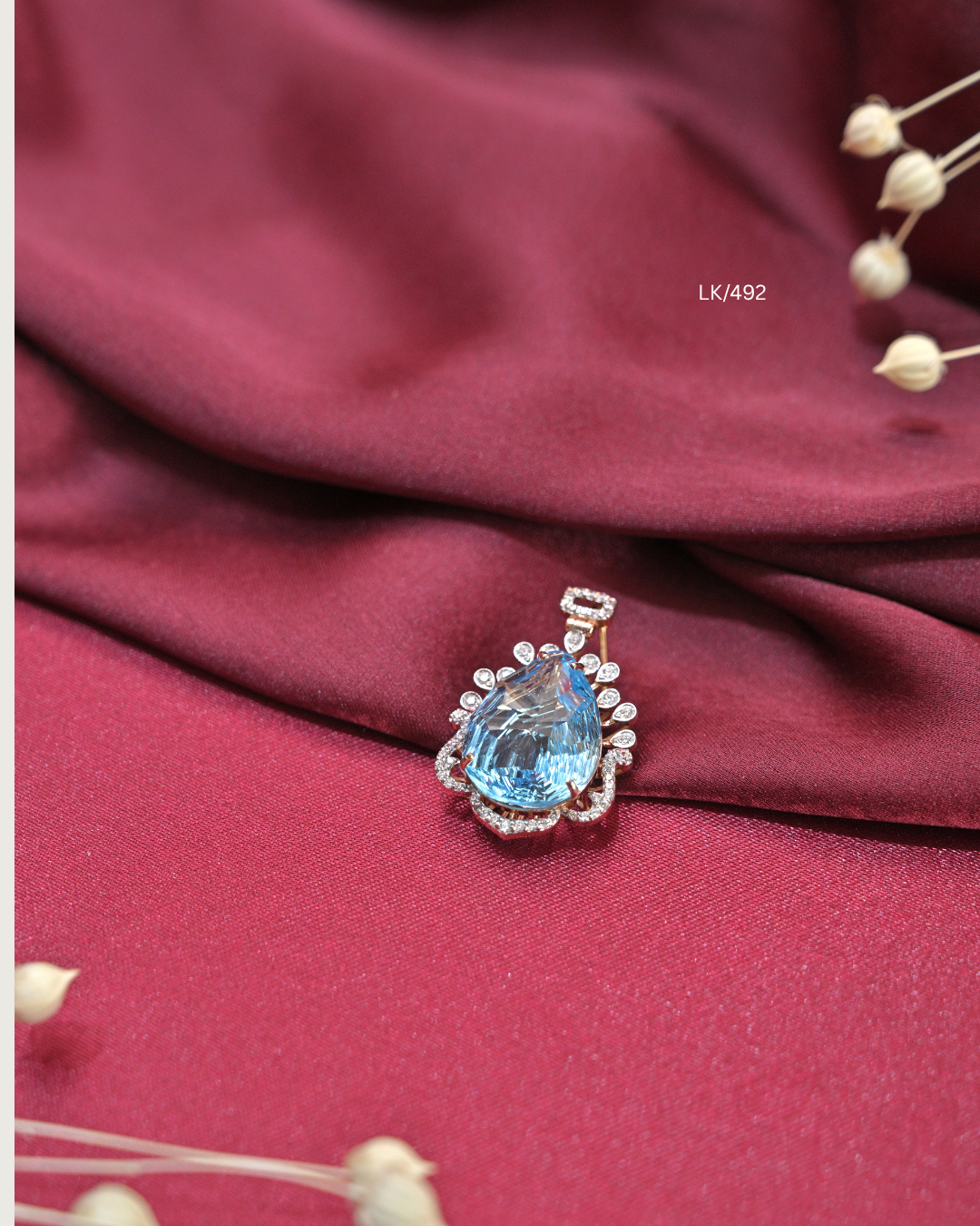 Pear-Cut Aquamarine-Blue Gemstone & CZ Sunburst Frame Pendant | SKU: LK/492