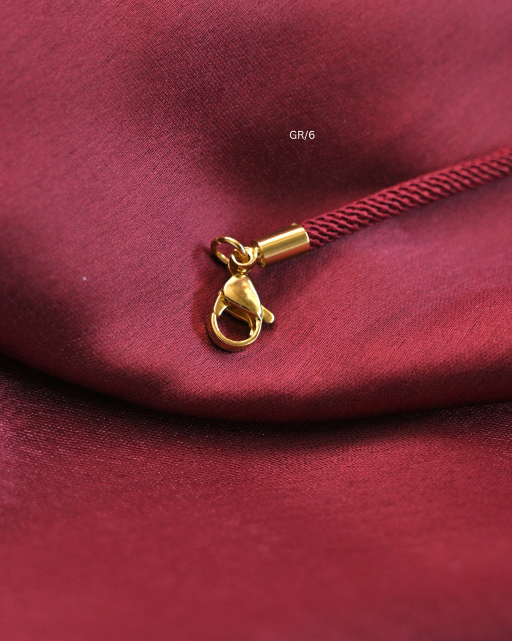 Sacred Om & CZ Halo Rakhi with Maroon Thread | SKU: GR/6