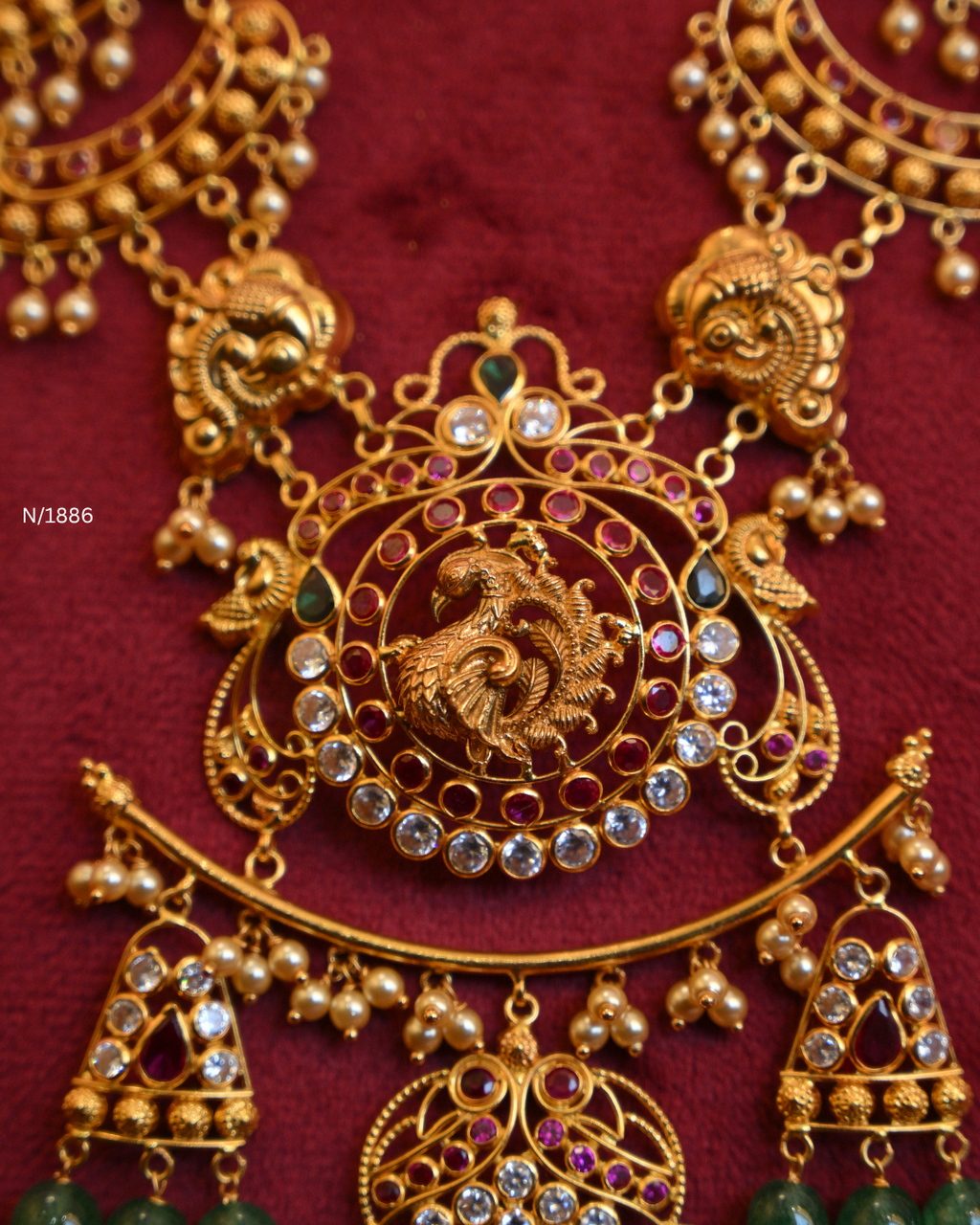 Grand Peacock Nakshi Temple Haram with Multi-Strand Pearls & Emerald Tassels | SKU: N/1886