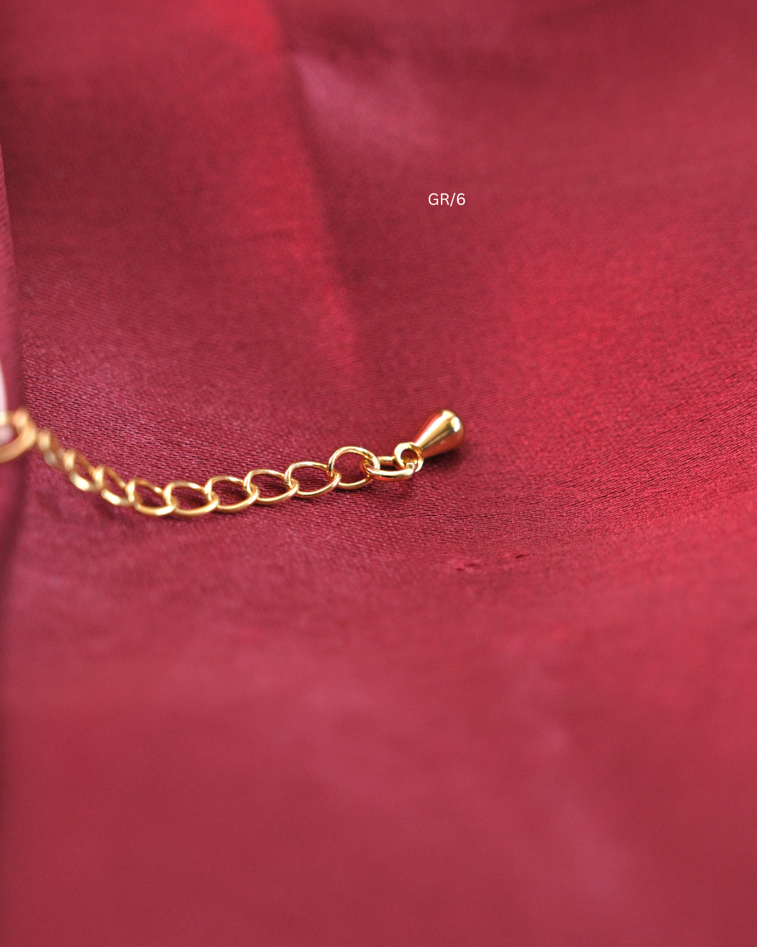 Sacred Om & CZ Halo Rakhi with Maroon Thread | SKU: GR/6